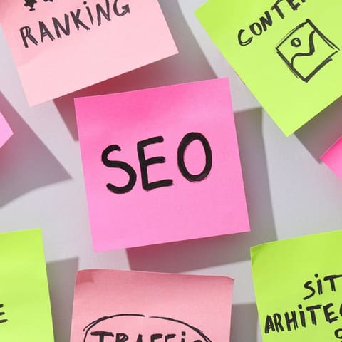 Sticky note with SEO written on it for a search engine optimization strategy