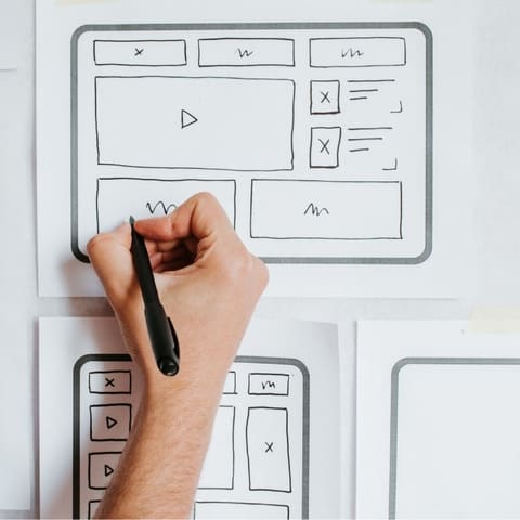 Hand sketching website wireframes for a small business website in Kempner, TX